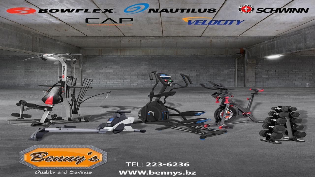 A display of various fitness equipment, including machines and weights, in a concrete space featuring the brand names Bowflex, CAP, Nautilus, Velocity, and Schwinn.