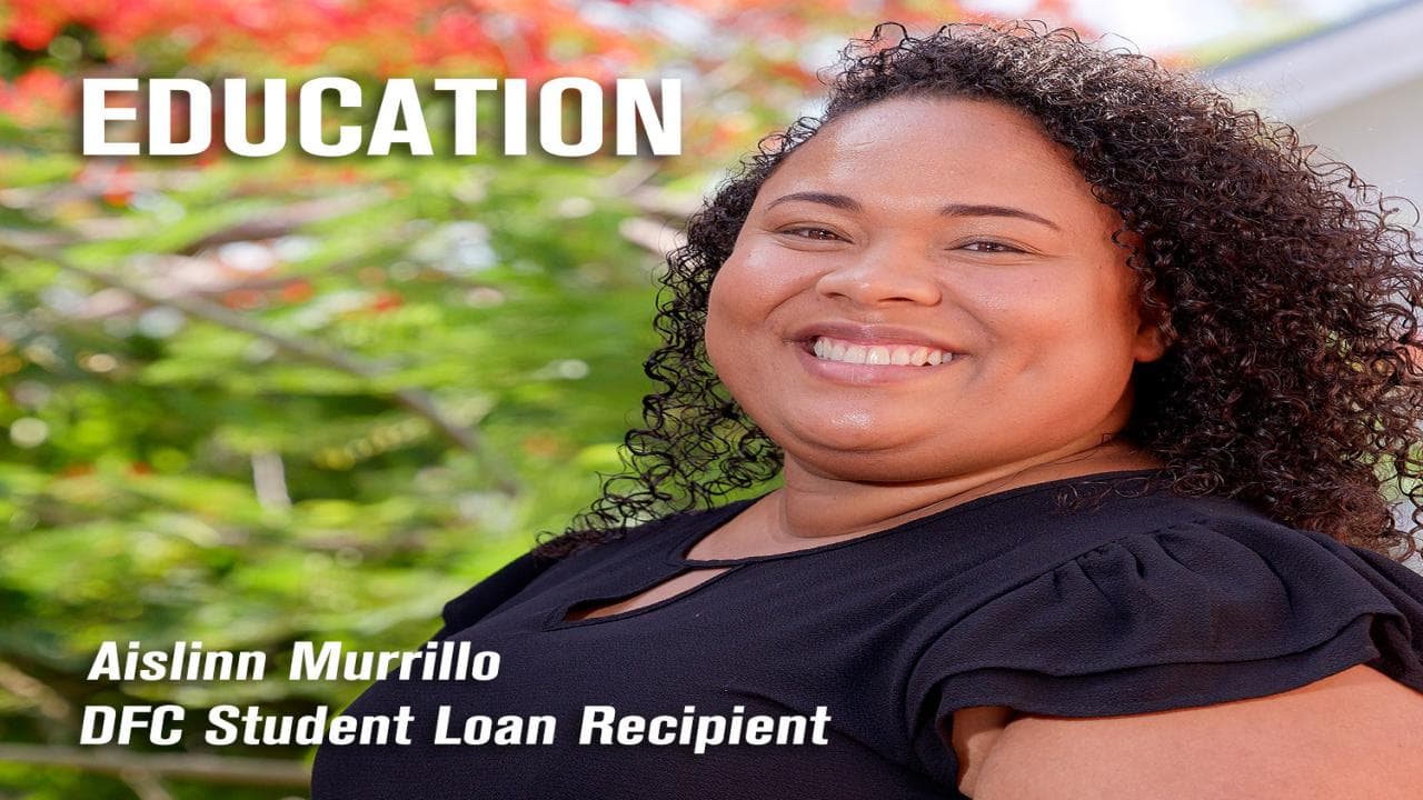 A smiling woman with curly hair poses outdoors, captioned as a student loan recipient.