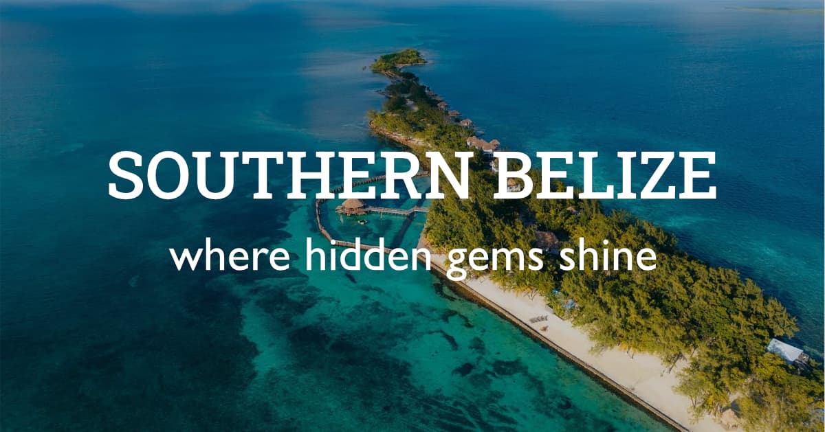 Aerial view of Southern Belize showcasing lush greenery and clear blue waters. Aerial view of Southern Belize showcasing lush greenery and clear blue waters.