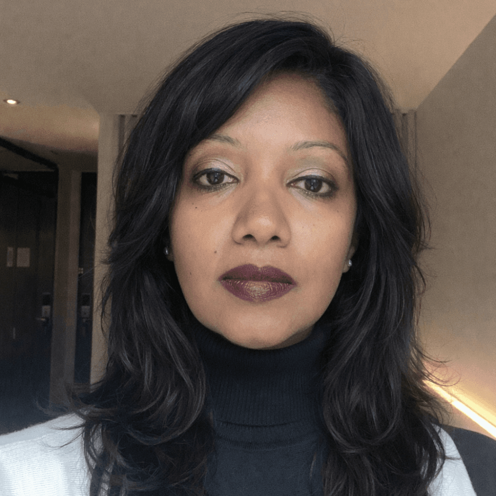 A woman with long, black hair.